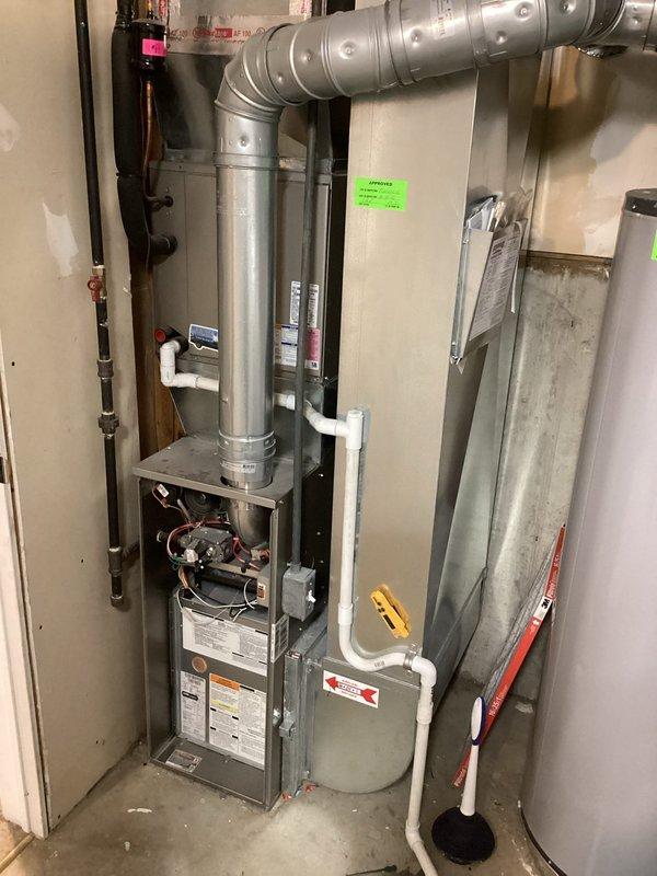 Completed annual maintenance on 9-year-old Carrier furnace (model WT, manufactured 09-2026). Performed full tune-up including inspection of heat exchanger, burners, and electrical components. System is functioning properly with no issues identified; condensate drainage system and ductwork connections are in good condition.