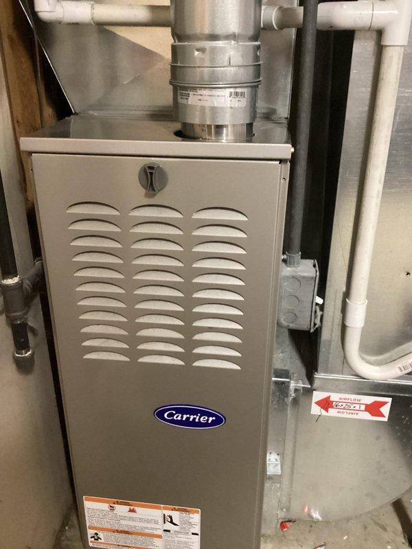 Completed annual maintenance on 9-year-old Carrier furnace (model WT, manufactured 09-2026). Performed full tune-up including inspection of heat exchanger, burners, and electrical components. System is functioning properly with no issues identified; condensate drainage system and ductwork connections are in good condition.