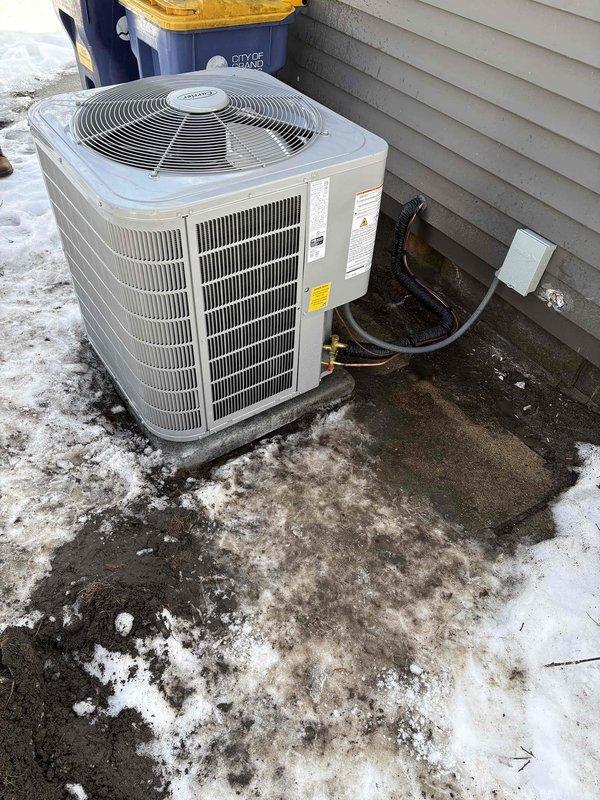 Completed full system replacement of aging HVAC equipment with new high-efficiency furnace and air conditioning unit. Installed outdoor condenser on existing concrete pad with proper refrigerant line connections and electrical hookups. System was properly integrated with existing home ductwork and tested for optimal performance.