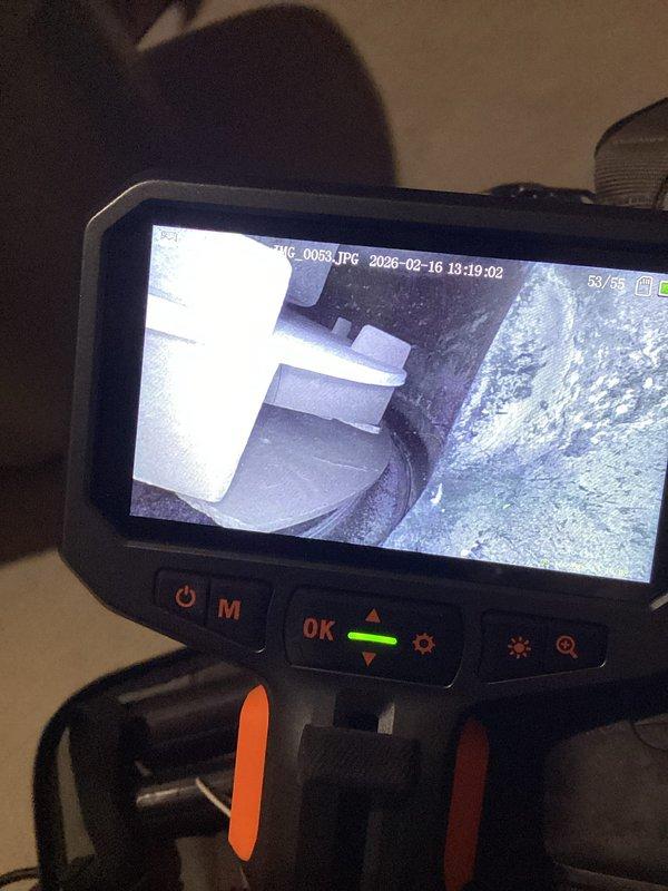 Responded to noise complaint from 15-year-old water heater. Utilized inspection camera to examine internal components, identifying scale buildup and sediment accumulation as noise source. Documented condition with borescope imagery showing deteriorated components within tank and associated plumbing system.