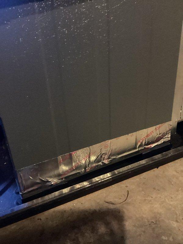 Responded to quoted repair request to investigate persistent noise issues. Inspected furnace lower panel and rear blower housing for air gaps as recommended by manufacturer representatives. Applied metallic foil tape to seal gaps at the bottom edge of the unit and verified proper installation of PVC exhaust piping with no leaks or condensation present.