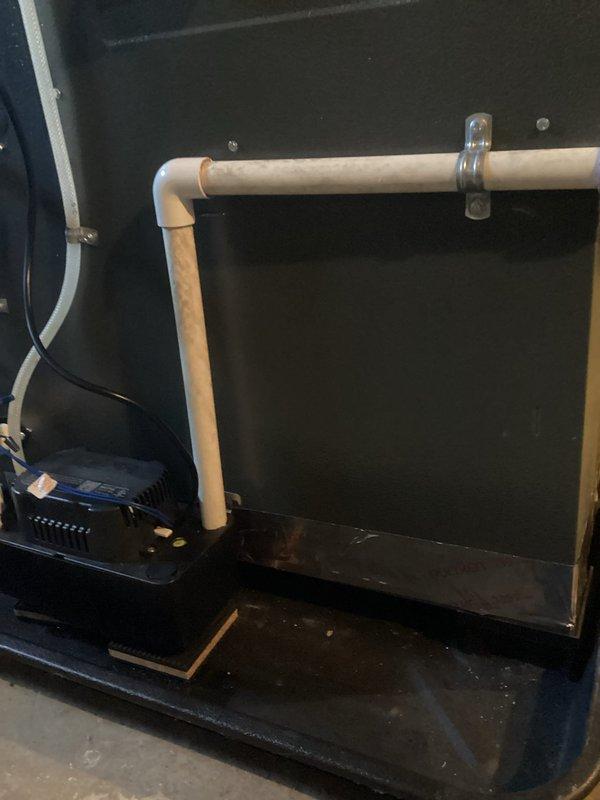 Responded to quoted repair request to investigate persistent noise issues. Inspected furnace lower panel and rear blower housing for air gaps as recommended by manufacturer representatives. Applied metallic foil tape to seal gaps at the bottom edge of the unit and verified proper installation of PVC exhaust piping with no leaks or condensation present.