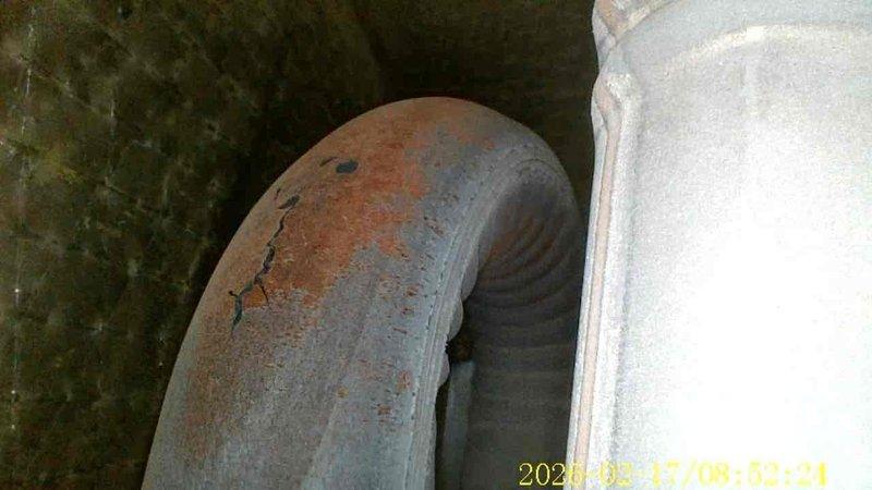 Completed FSTU on 19-year-old Goodman furnace, discovering significant structural damage to surrounding wall material and severe corrosion with visible cracking on the exhaust piping. Documented conditions with photos and recommended immediate repairs to address safety concerns related to the deteriorated vent pipe and damaged wall structure.