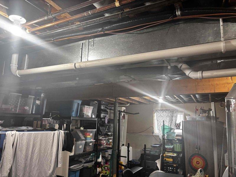 Responded to call regarding frozen furnace ventilation causing window damage. Inspected exterior vent installation and identified improper termination allowing condensation to form on nearby window. Rerouted PVC exhaust pipe in basement to create proper clearance from window and installed proper termination kit to prevent future freezing issues. System now venting correctly with no condensation formation on adjacent surfaces.