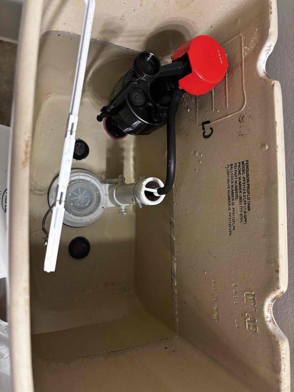 Responded to customer complaint of toilet running in half bath. Inspected tank interior and identified worn flapper valve causing water to leak into bowl. Replaced flapper valve and adjusted fill valve height to proper water level, eliminating the running sound. Verified proper flush operation and confirmed no further leaks.