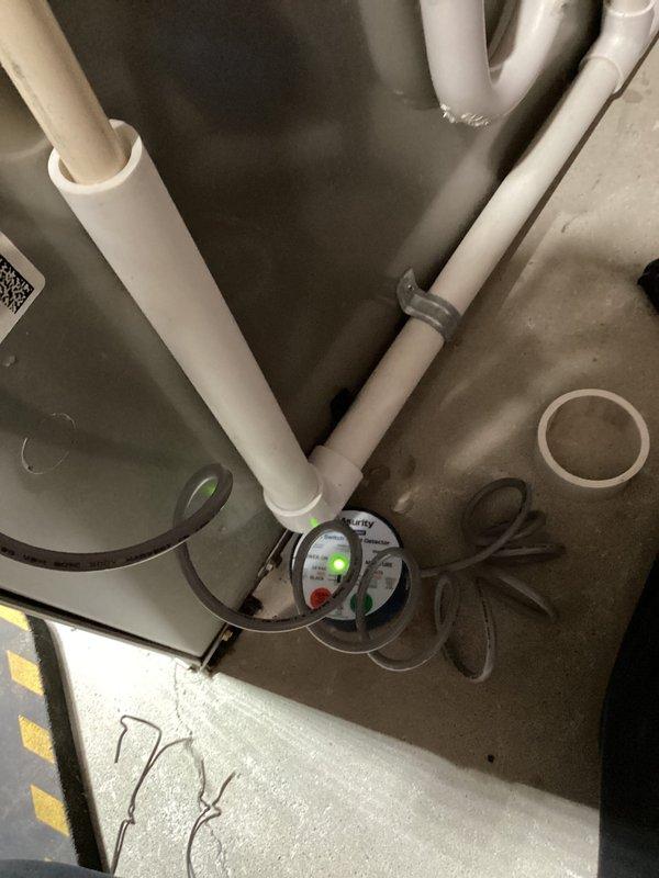 Performed annual heating maintenance on 13-year-old Carrier furnace. Inspected condensate drain system and verified proper operation of safety switches and pressure monitoring equipment. System is functioning correctly with all components in serviceable condition.