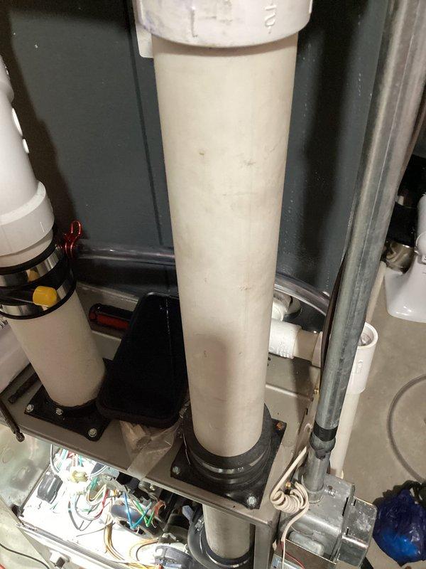 Performed annual heating maintenance on 13-year-old Carrier furnace. Inspected condensate drain system and verified proper operation of safety switches and pressure monitoring equipment. System is functioning correctly with all components in serviceable condition.