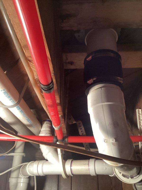 Responded to a service call for a leaking basement toilet in an older home (1949 construction). Upon inspection, found damaged toilet flange with visible discoloration and staining. Removed existing toilet, replaced deteriorated flange, and installed new wax ring and seals to prevent further water seepage. Verified proper function of waste pipe connections and ensured no leakage after reinstallation.