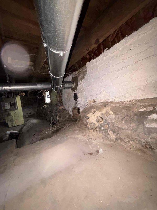 Completed installation of new chimney liner in residential basement mechanical room. Properly secured all metal ductwork connections with appropriate metal straps and tape, ensuring proper ventilation for the existing water heater and furnace system. Verified complete system functionality and documented installation with comprehensive photos of the mechanical area, including all connected HVAC and venting components.