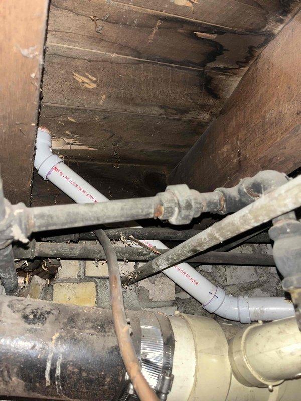 Successfully completed quoted repair involving floor penetration to install new PVC drain pipe for vanity. Connected new drainage system to the existing main stack, which included proper P-trap installation with appropriate fittings. Work was performed in confined underfloor space requiring specialized access techniques.