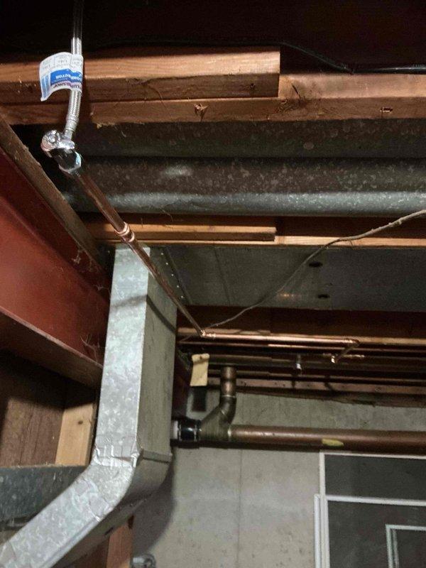 Successfully installed a new water supply line for customer's refrigerator, routing the line through ceiling joists and connecting to the existing copper plumbing system. Additionally, completed sink installation with proper connections to ensure functionality of both fixtures with no leaks observed during testing.