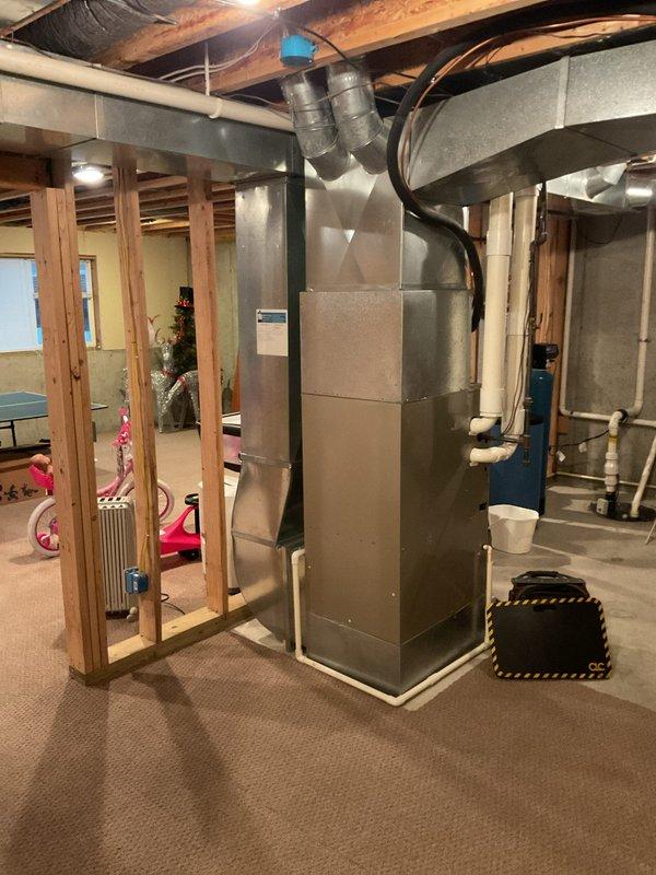 Performed annual furnace tune-up on 20-year-old unit without humidifier. Inspected all components, confirmed proper operation, and documented equipment condition with photos. System is functioning normally with no immediate concerns identified.