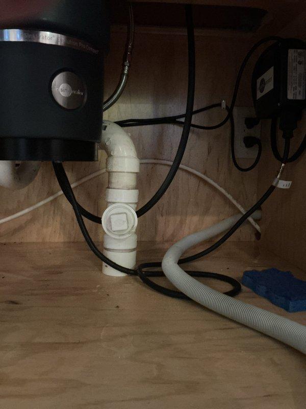 Completed dishwasher installation service, removing existing unit and installing new dishwasher. Identified and resolved water leak from supply line connection, ensuring proper drainage through existing disposal system. Verified all connections were secure and leak-free before completing installation.