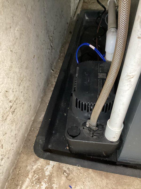 Performed annual heating maintenance on 2.5-year-old EnergiAir WT 10-2033 furnace. Inspected and photographed condensate pump system, verifying proper installation and function. No humidifier present in system as noted in service records.