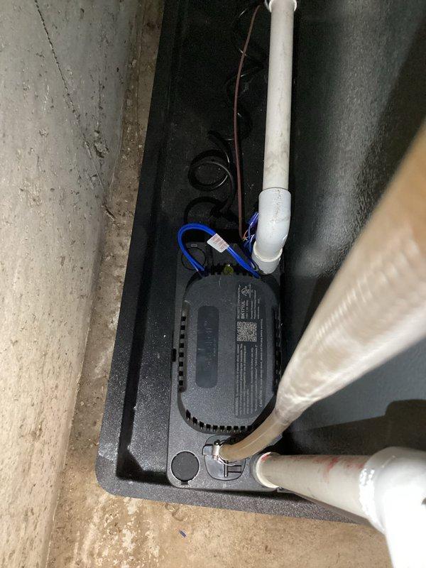Performed annual heating maintenance on 2.5-year-old EnergiAir WT 10-2033 furnace. Inspected and photographed condensate pump system, verifying proper installation and function. No humidifier present in system as noted in service records.