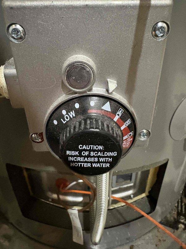 Responded to a service call for insufficient hot water supply from a 5-year-old Rheem water heater. Upon inspection, found temperature setting was too low; adjusted the thermostat to appropriate level after informing customer about scalding risks. Verified proper operation and confirmed system now producing adequate hot water volume.