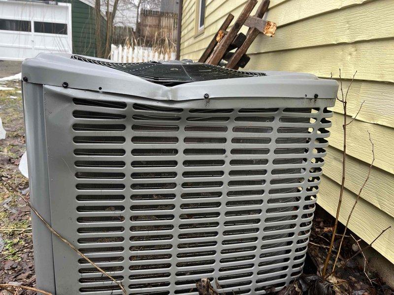 Inspected 14-year-old York outdoor condenser unit after reported ice damage. Unit appears to be in normal working condition with only minor weathering on the exterior. Determined condenser replacement is not necessary prior to upcoming furnace installation.