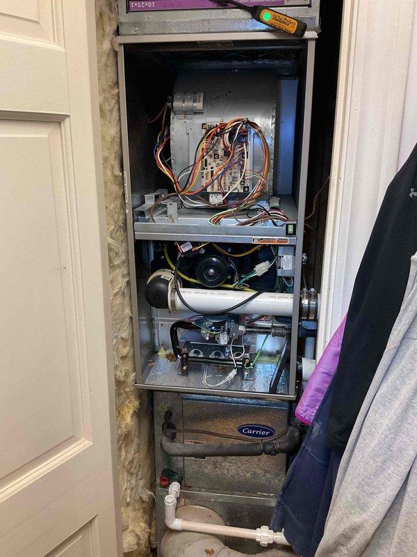 Performed complimentary tune-up service on two Carrier furnaces (approximately 3 years old) - one located in basement and one in master bedroom. Both units were inspected with panels removed to check electrical connections, motors, and ventilation components. Systems have humidifier installed. All components were found in normal working condition with no issues identified. Both furnaces were returned to service operating properly.