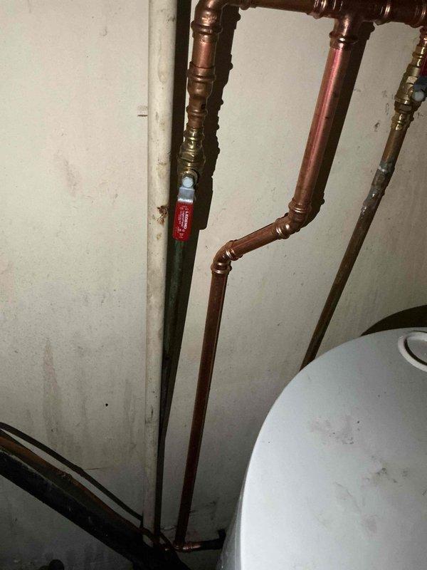 Responded to a service call regarding a water line issue resulting from previous work where another plumber had capped one line but cut a different line without repair. Upon inspection of the copper plumbing system in the utility room, identified the incorrectly cut line and performed necessary repairs to restore proper water flow and system integrity.