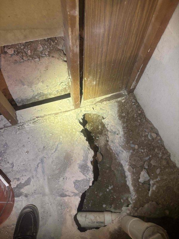 Completed installation of half bathroom in basement, including toilet and sink fixtures. Remediated significant concrete floor damage with extensive cracking and deterioration that was discovered during project preparation. Addressed moisture-related issues including mold growth and water damage to subsurface areas, ensuring proper sealing and structural integrity before completing the plumbing installation.