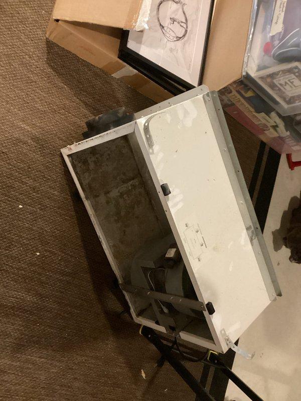 Successfully removed Energy Recovery Ventilator (ERV) from HVAC system in basement utility area as quoted. Disconnected unit from existing ductwork and mounting framework, completing full extraction of the ventilation component per work order specifications.