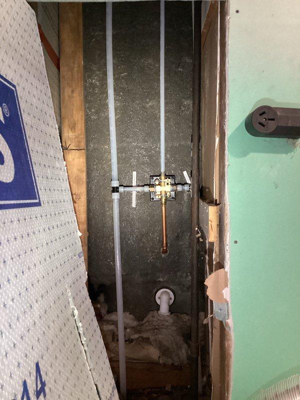 Completed whole-home re-pipe installation, replacing existing plumbing with new PVC piping throughout the residence. Work included accessing wall cavities to replace old copper/brass components with modern PVC fixtures and fittings. Additionally installed new water heater as part of the comprehensive plumbing system upgrade.