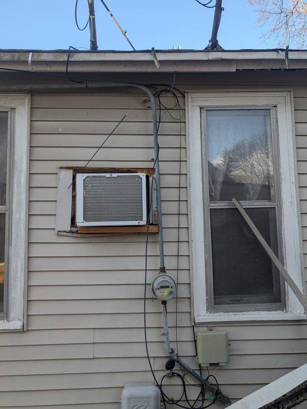 Conducted furnace estimate for tenant-occupied property with non-functioning heating system. Inspected aging furnace (15-20 years old) with suspected thermostat issues and documented existing HVAC configuration, including window AC unit installation. Met with property owner to discuss replacement options and system recommendations based on collected measurements and assessment findings.