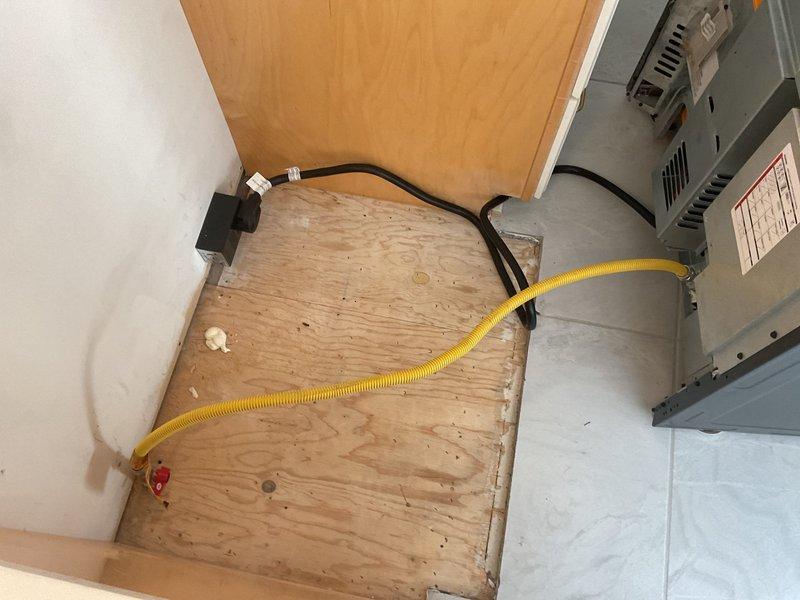 Repositioned gas line in cabinet area as previously discussed. Verified proper connection of yellow flexible gas line and ensured secure installation. Confirmed no leaks and proper functionality of nearby HVAC unit after service completion.