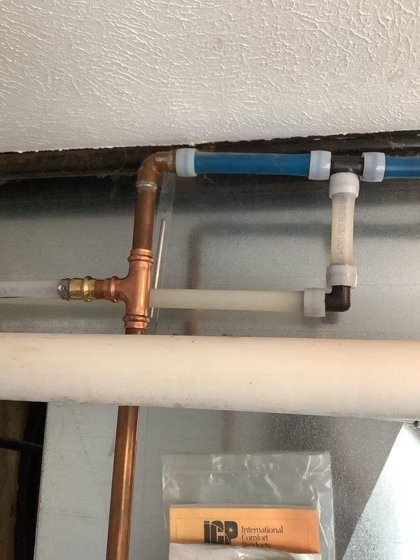 Successfully completed installation of a 30,000-grain capacity water softener system with proper connection to existing plumbing infrastructure. Installation included integrating copper piping with PVC segments using appropriate fittings and securing all components to structural elements. Applied veteran's discount and combo discount as part of comprehensive service package.
