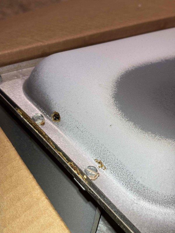 Completed quoted repair for heat exchanger (HTX) replacement. Visual inspection revealed metal component with significant perforation and surrounding corrosion damage. Removed damaged unit, installed new heat exchanger, and verified proper operation before completing service.