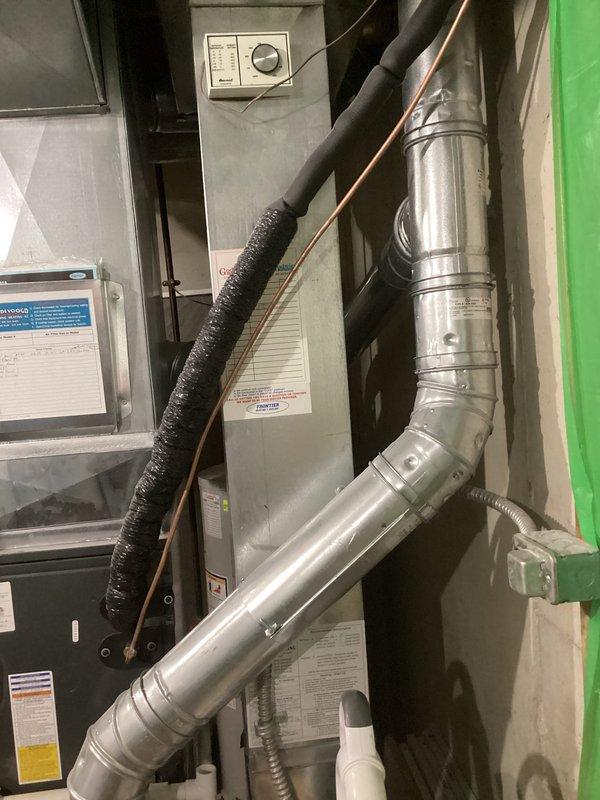 Completed annual heating maintenance on furnace and humidifier system. Inspected exposed ductwork, refrigerant lines, and control components in utility space. Service included visual examination of the air handler unit, flexible duct connections, and associated plumbing infrastructure as part of the recurring maintenance agreement.