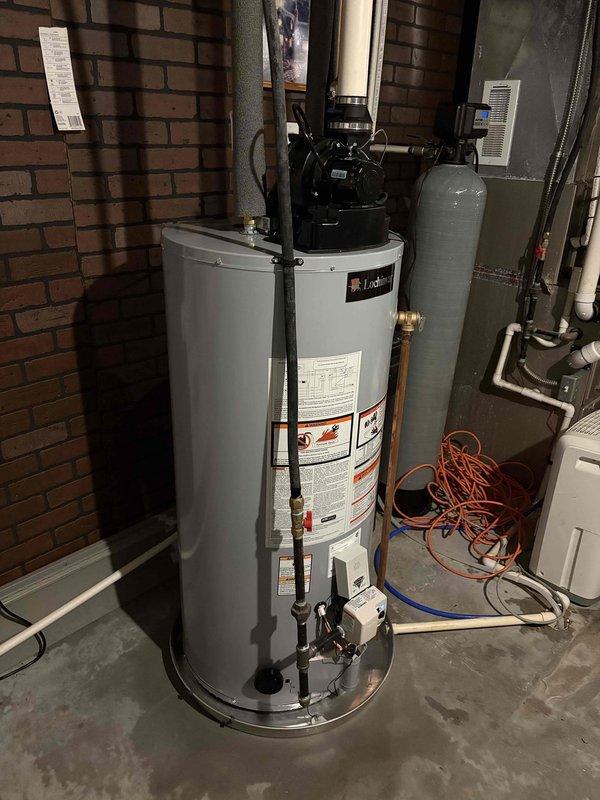 Responded to service call for 4-year-old LOCH water heater that was leaking and not lighting. Inspected unit and associated PVC venting system. Performed necessary repairs to address leak and restored ignition functionality to return water heater to proper working condition.
