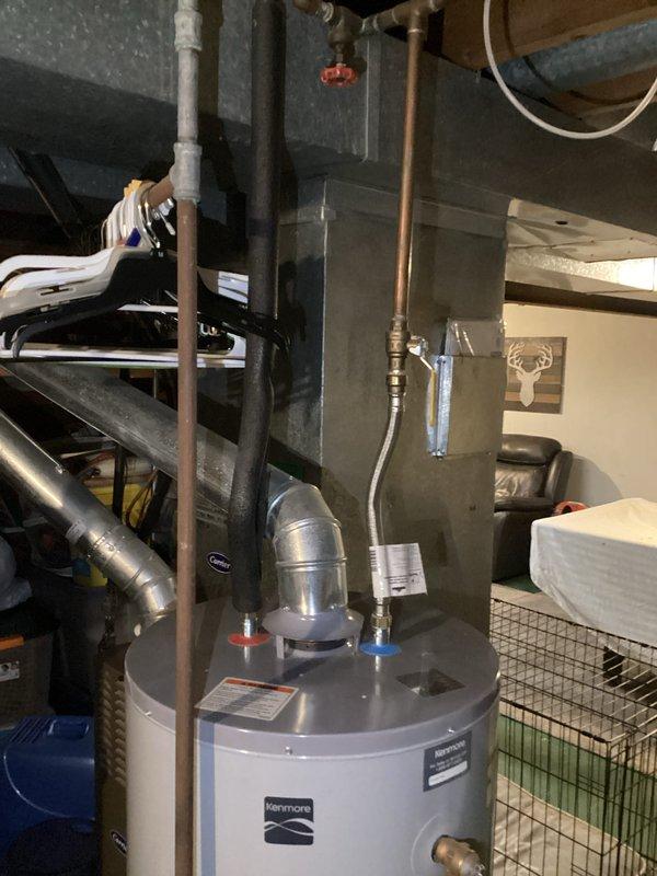 Diagnosed Kenmore water heater with fast 7-blink error code indicating thermostat/control board failure. Replaced faulty control board and tested system, confirming proper ignition and heating function. Water heater now operating normally with consistent hot water supply.