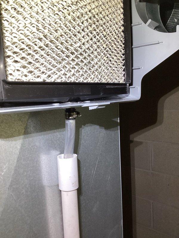 Performed annual maintenance on EnergiAir furnace and humidifier system (model WT 08-2034). Inspected and photographed the humidifier unit, confirming proper installation of the evaporative water panel and verifying integrity of water supply connections including PVC and copper tubing. System is functioning within normal parameters.