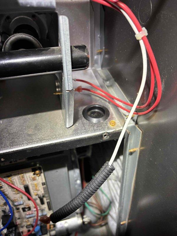 Completed annual heating maintenance on furnace and humidifier system (6-year service). Inspected internal electrical components including circuit board connections, blower motor assembly, and wiring integrity. All systems functioning properly with no issues identified.