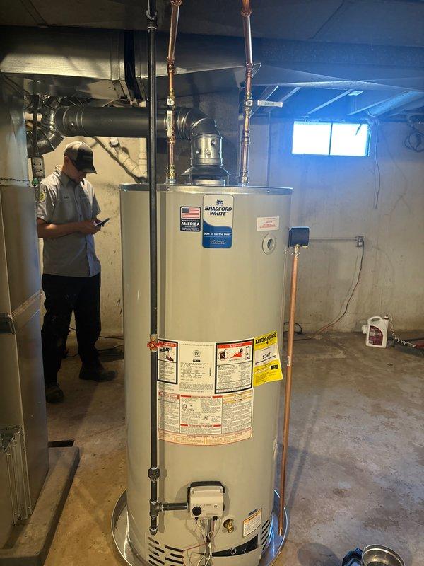 Successfully completed installation of a new Carrier AC unit, furnace, and water heater as per agreement. AC unit was properly mounted on concrete pad with appropriate electrical connections and insulated line set. Water heater was installed in basement with copper piping connections to existing plumbing system. All systems were tested and confirmed to be functioning correctly.