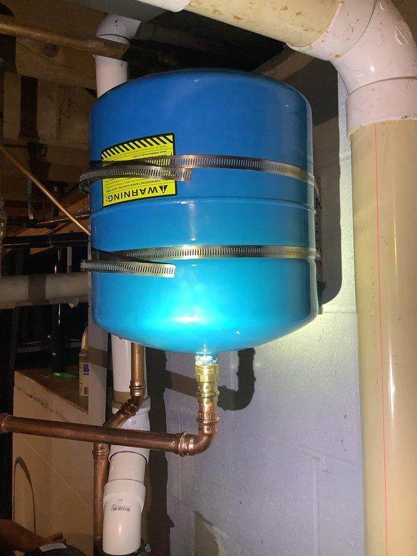 Installed a 50-gallon power-vented natural gas water heater with powered anode rod, including a new domestic hot water expansion tank and upgraded recirculation pump. Properly secured all components with appropriate strapping and verified proper operation of the entire system. Completed work to code with all necessary connections to existing copper piping infrastructure.