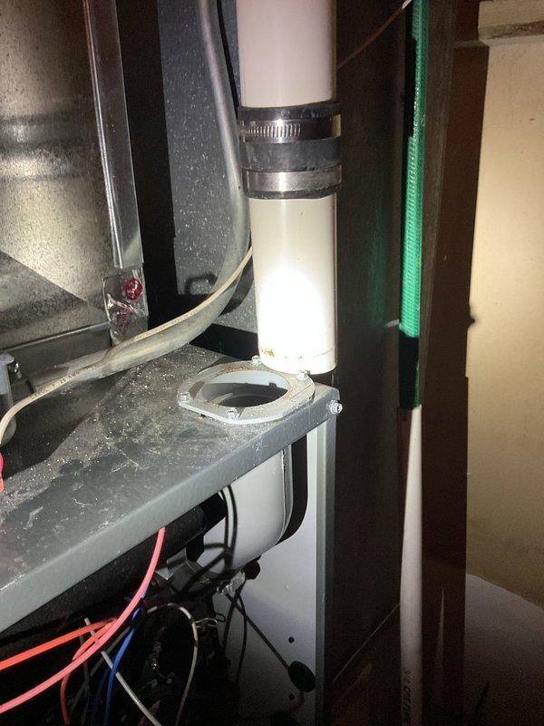 Performed annual tune-up on Ultram furnace (approx. 40 years old). Inspected PVC venting system and mounting brackets, which appear in good condition despite age. No humidifier present. Verified proper electrical connections and took documentation photos of the installation. System is operational with maintenance scheduled for 2025.