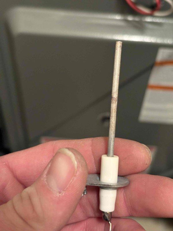 Completed annual heating maintenance on 18-year-old Trane furnace. Inspected igniter assembly which appeared intact and functional. Performed standard tune-up procedures with no humidity control system present. System is operational with no immediate concerns identified.