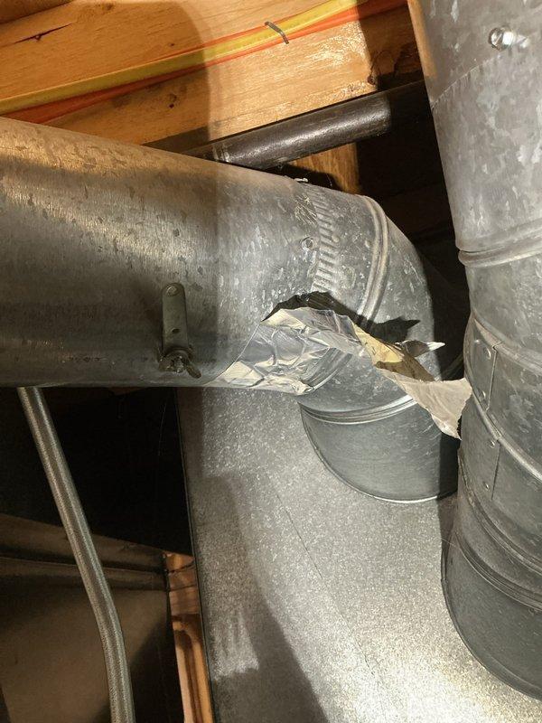 Performed scheduled FSTU on customer's end-unit condo furnace. Inspected and verified integrity of galvanized metal ductwork in attic space, paying particular attention to 90-degree connections and joint seals. Confirmed proper installation of duct tape seals at critical junction points and checked security of mounting brackets where ductwork connects to the building's structural elements.