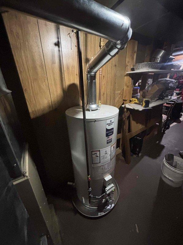 Successfully installed new water heater in basement utility room, including proper connection to existing metal ductwork and ventilation system. Ensured all manufacturer specifications were met with appropriate piping connections and verified system functionality before completion.