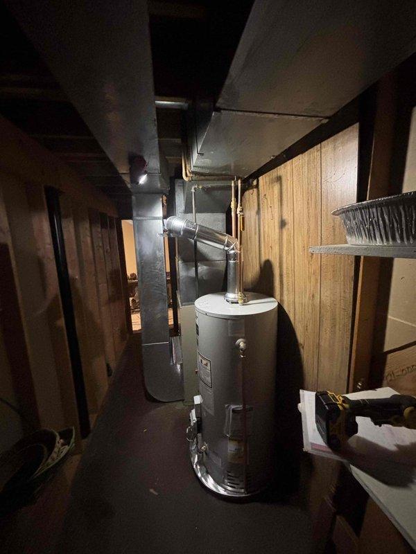 Successfully installed new water heater in basement utility room, including proper connection to existing metal ductwork and ventilation system. Ensured all manufacturer specifications were met with appropriate piping connections and verified system functionality before completion.