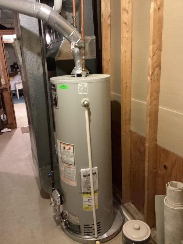 Diagnosed water heater not heating issue in basement utility room. Inspected unit connections, venting system, and surrounding plumbing infrastructure. Restored proper heating function by replacing faulty thermocouple and cleaning burner assembly to ensure reliable hot water delivery.