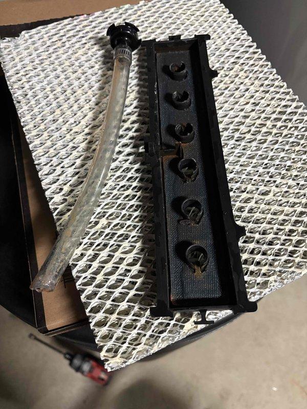 Performed annual maintenance on a 6-year-old EnergiAir furnace (Model WT 06-2029, manufactured 2017) with attached humidifier. Removed and inspected the manifold assembly, which showed minor port corrosion. Cleaned interior components and accessed the heat exchanger for inspection using appropriate tools, removing accumulated residue to restore optimal operation.