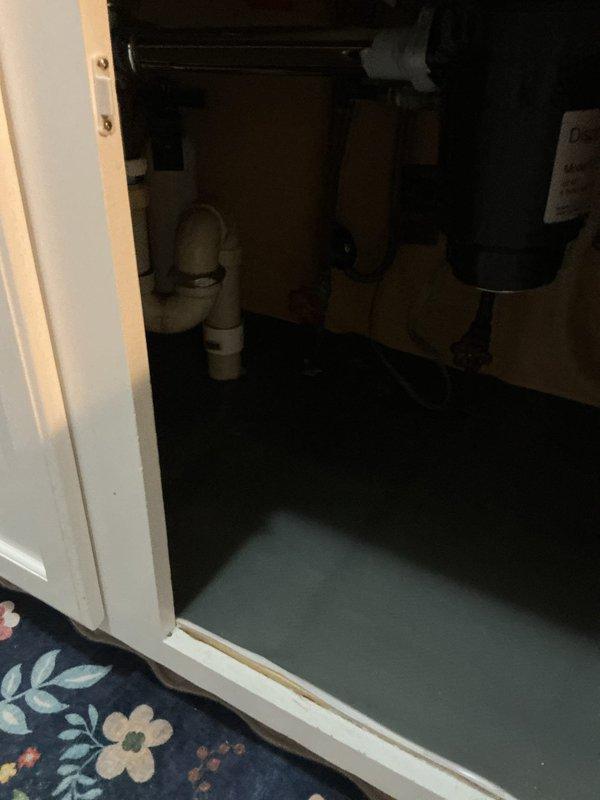 Completed complimentary whole home plumbing inspection, focusing on bathroom and utility closet areas. Inspected bathroom fixtures including tub, shower, and toilet for proper function and potential leaks. Examined water heater installation and PVC drain pipe configuration in utility closet, noting current condition and identifying any maintenance needs. Photos documented all inspected components for reference.