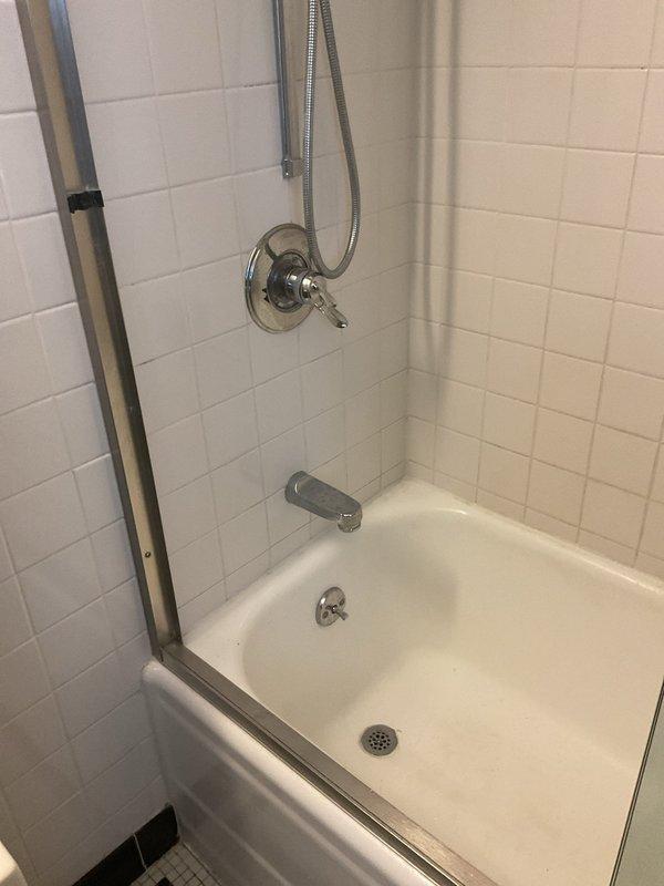 Cleared recurring bathroom drainage issues in both sink and tub that had persisted for several months in a 90-year-old home, which previous chemical drain opener treatments had failed to resolve. Performed thorough drain cleaning service to remove accumulated debris and restore proper drainage functionality to both fixtures.