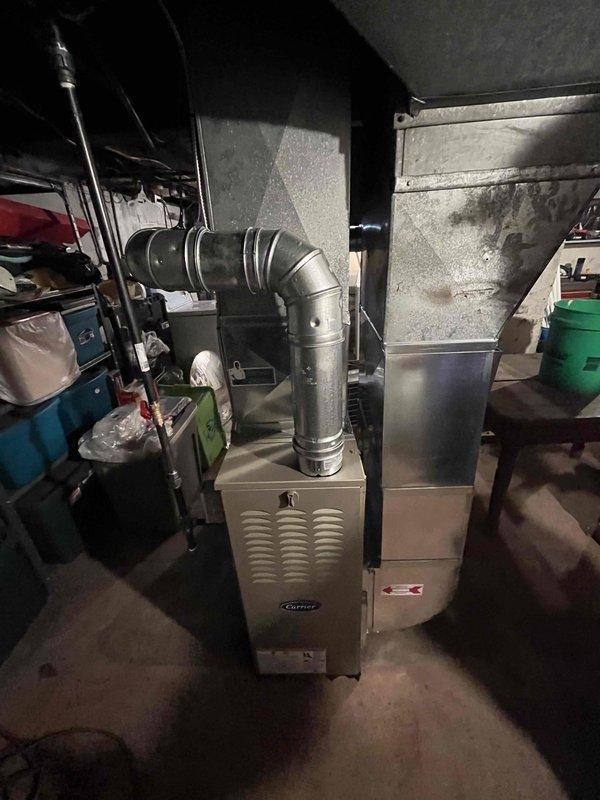 Successfully completed installation of new Carrier furnace and water heater in residential utility area. Properly connected all ductwork, plumbing, and electrical components to ensure system functionality. All connections were verified for proper sealing, with no leaks detected in the plumbing system.