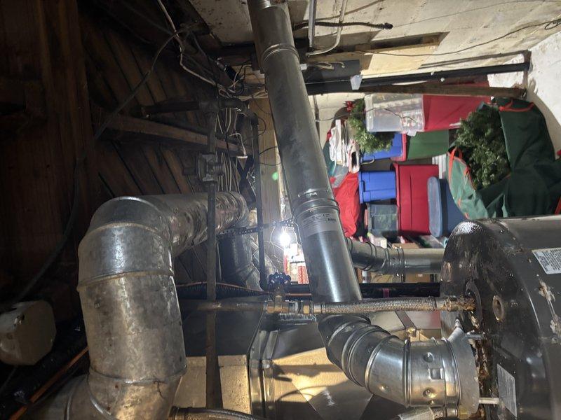 Responded to no hot water complaint for 8-year-old Rheem water heater. Inspected electrical connections at junction box and found loose wiring causing power interruption. Repaired electrical connections and verified proper operation of heating elements, restoring hot water functionality.