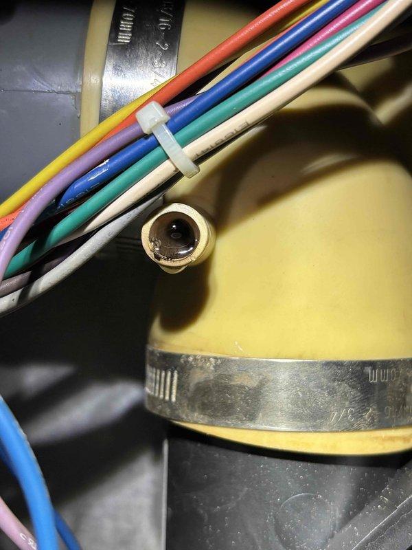 Diagnosed short cycling issue on 14-year-old EnergiAir furnace. Identified damaged access panel with improvised cutout and inspected wiring connections. Repaired electrical components and restored proper cycling operation to resolve partial heating problem.