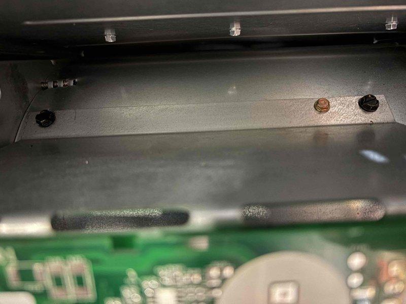 Responded to no heat call for 0-year-old furnace. Inspection revealed faulty circuit board connections. Repaired loose terminals and secured fasteners on control panel, restoring proper electrical contact. System now functioning normally with heat production verified.